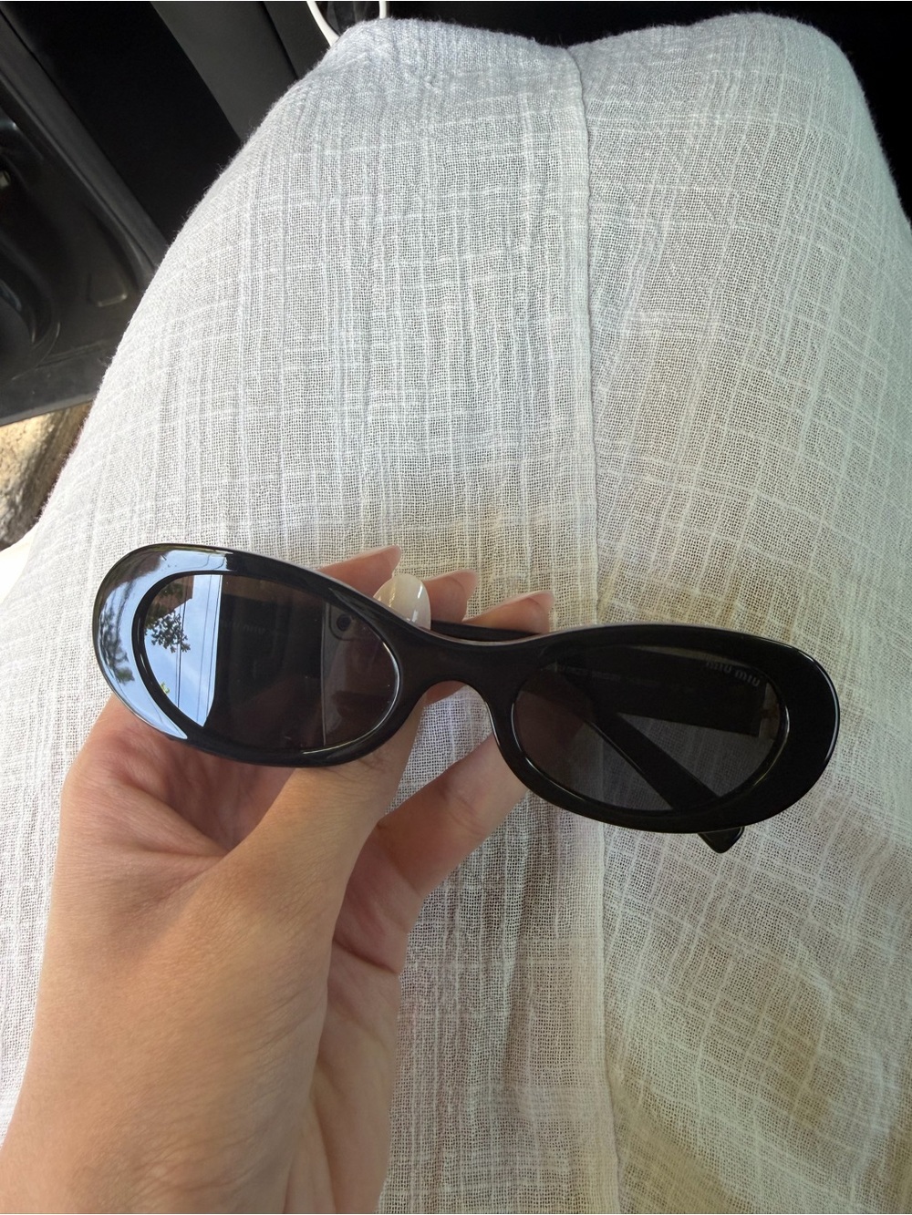 Miu Miu Black Oval Sunglasses - Picture 3 of 3